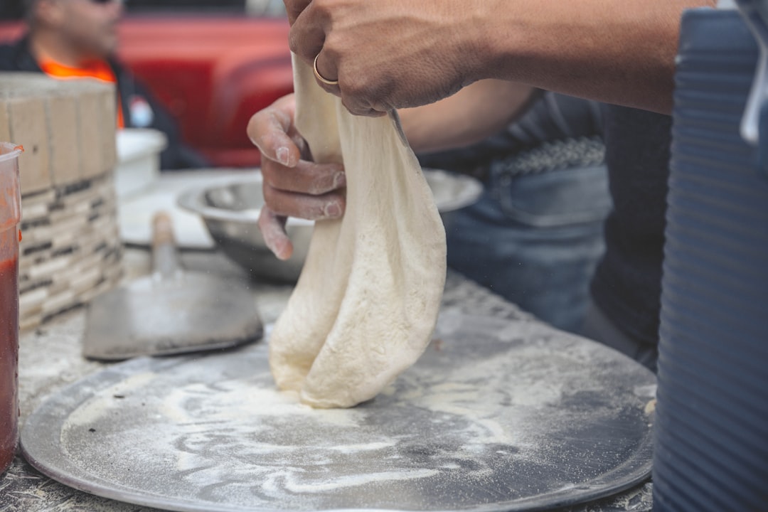 Chef cooking pasta in a professional kitchen